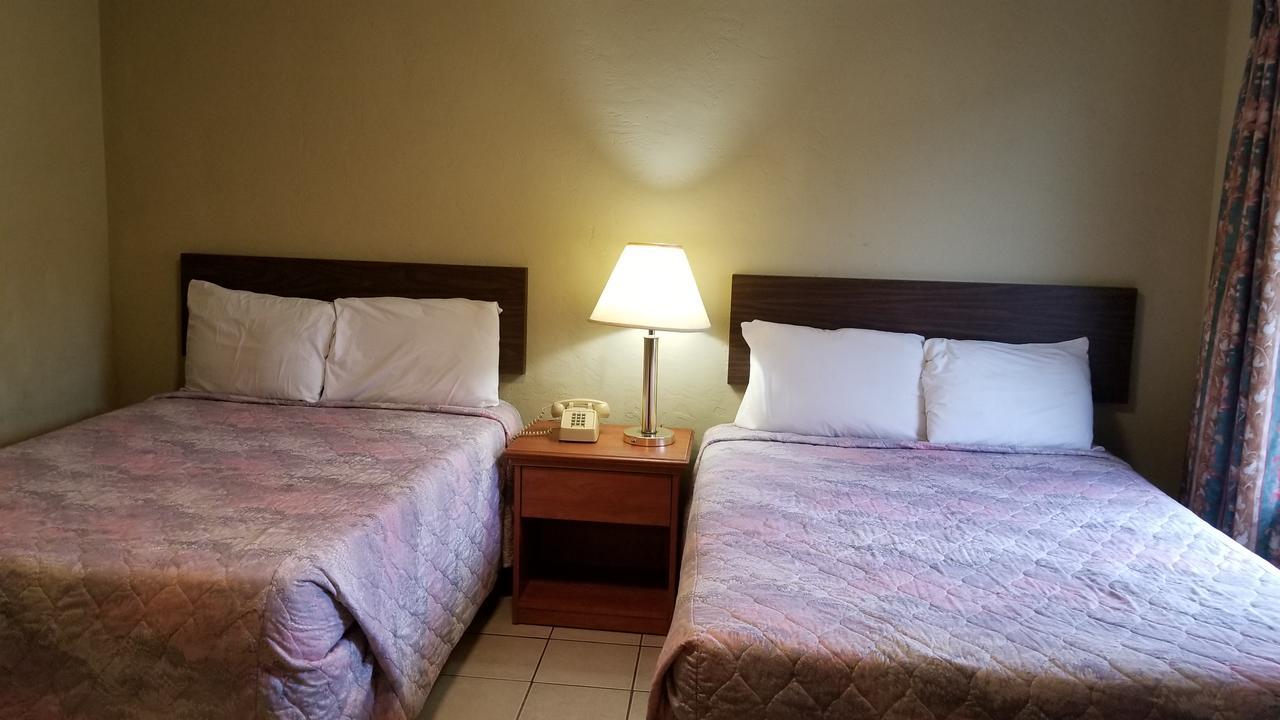 Quick Stop Motel Round Prairie Esterno foto